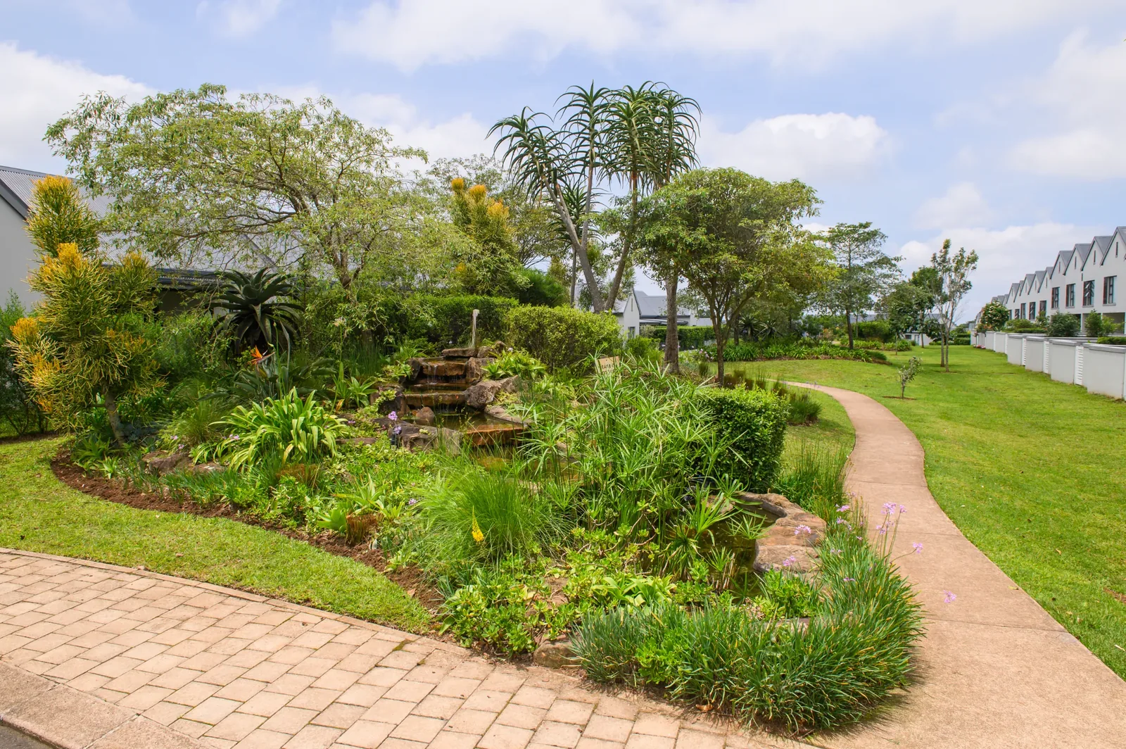 Emberton Estate, lush garden and walking path